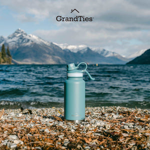 Insulated Travel Water Bottle with Two Stylish Ergonomic Handle Lids 32oz/946ml - Atlantis Blue - Grandties