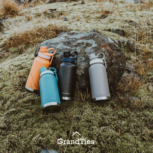 Insulated Travel Water Bottle with Two Stylish Ergonomic Handle Lids 32oz/946ml - Carrot - Grandties